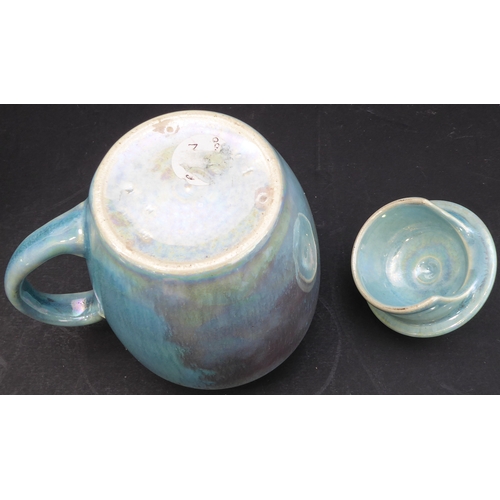 27 - A Ruskin Pottery jug-and-cover with lustreware-style glaze. Together with an unusual studioware styl... 