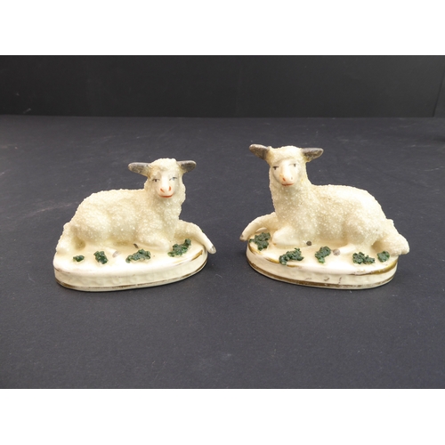 28 - Eleven miniature ceramics to include:
 a pair of 19th century Staffordshire-style recumbent lambs (1... 