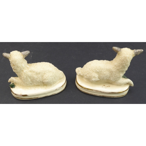 28 - Eleven miniature ceramics to include:
 a pair of 19th century Staffordshire-style recumbent lambs (1... 