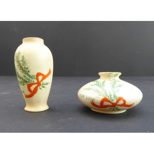 28 - Eleven miniature ceramics to include:
 a pair of 19th century Staffordshire-style recumbent lambs (1... 