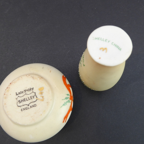 28 - Eleven miniature ceramics to include:
 a pair of 19th century Staffordshire-style recumbent lambs (1... 