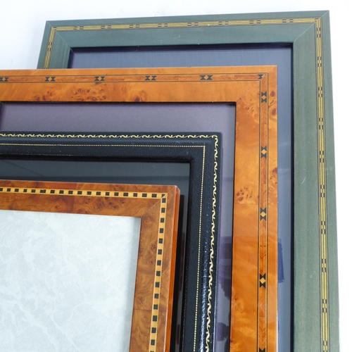 384 - Four good photo frames:
 Smythson black leather (28.5 x 23.5 cm);
 Addison Ross (30.5 x 25.5 cm);
 t... 