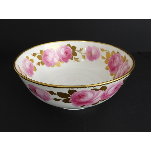 39 - An early 20th century George Jones ceramic bowl: hand-gilded and decorated with pink roses in border... 
