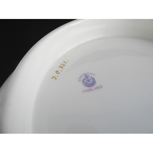 39 - An early 20th century George Jones ceramic bowl: hand-gilded and decorated with pink roses in border... 