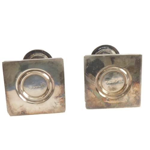 210 - A selection of silver and silver-plate to include a hallmarked-silver caster, a pair of dwarf silver... 