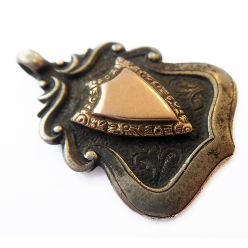 363 - A WWI gold-coloured shield mounted presentation pendant engraved to the reverse ''G'. Coy 3 RD BN Li... 