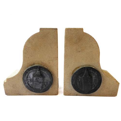 367 - An unusual pair of heavy Portland stone bookends made from stone from the Houses of Parliament after... 