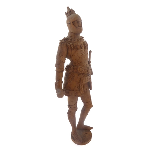 407 - A finely carved wooden figure model of a high-ranking knight in full armour, coronet upon his head (... 