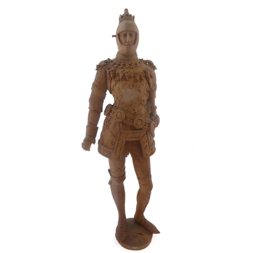 407 - A finely carved wooden figure model of a high-ranking knight in full armour, coronet upon his head (... 
