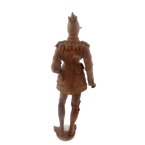 407 - A finely carved wooden figure model of a high-ranking knight in full armour, coronet upon his head (... 