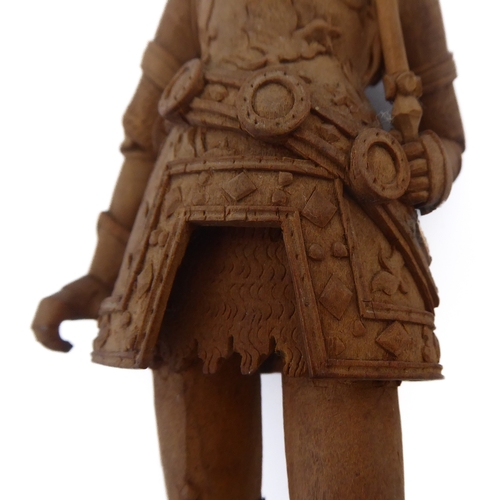 407 - A finely carved wooden figure model of a high-ranking knight in full armour, coronet upon his head (... 