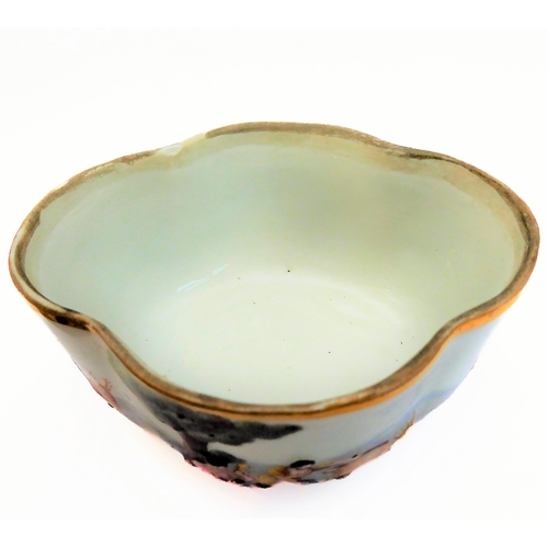 50A - A late 19th century quatrefoil-shaped, continental porcelain box and cover in Capo di Monte style: h... 