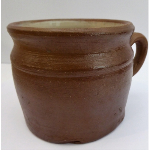 55 - Seven salt-glazed stoneware ale tankards each with ribbed strap handles, together with a Doulton Lam... 