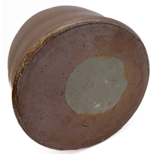 55 - Seven salt-glazed stoneware ale tankards each with ribbed strap handles, together with a Doulton Lam... 