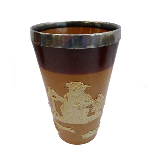 55 - Seven salt-glazed stoneware ale tankards each with ribbed strap handles, together with a Doulton Lam... 