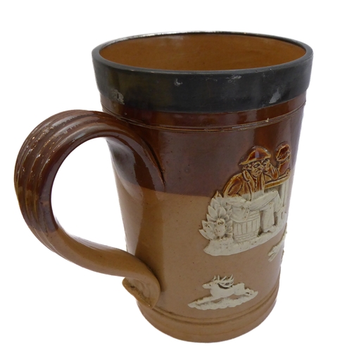 55 - Seven salt-glazed stoneware ale tankards each with ribbed strap handles, together with a Doulton Lam... 