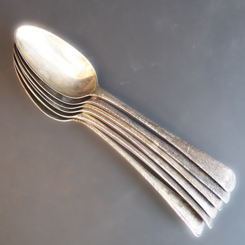 187 - Six large and heavy 18th century hallmarked silver serving spoons: each with bright-cut decoration a... 