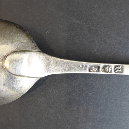 187 - Six large and heavy 18th century hallmarked silver serving spoons: each with bright-cut decoration a... 