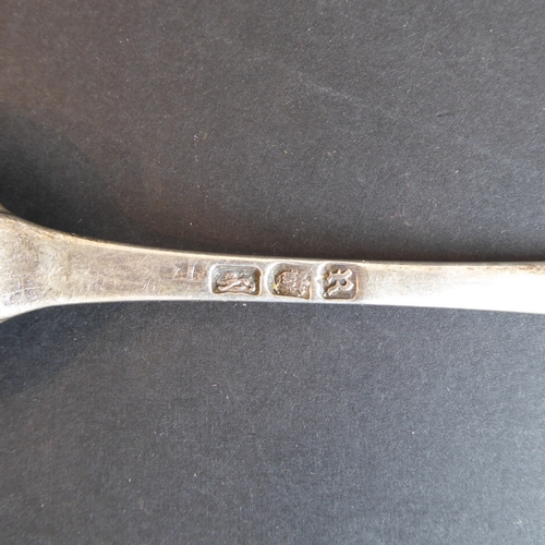 187 - Six large and heavy 18th century hallmarked silver serving spoons: each with bright-cut decoration a... 