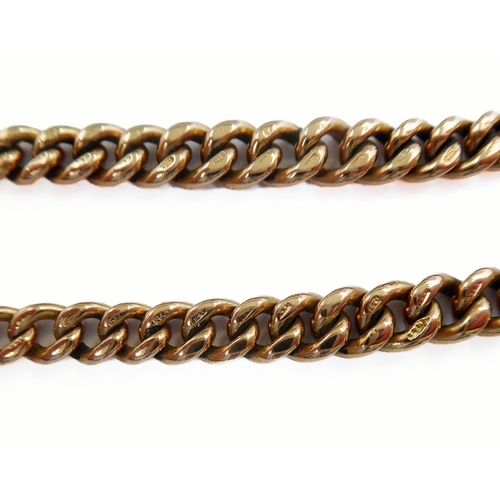 228 - A 9-carat yellow gold graduated curb link chain with two swivel terminals and suspending 9-carat yel... 