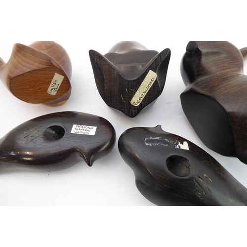 374 - JOHN MAINWARING - a collection of five hand-carved birds and animals to include a pair of swallows a... 