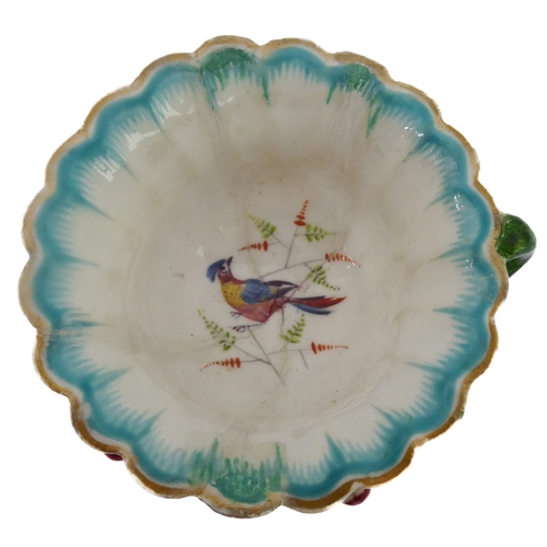 38 - Early/mid 19th century ceramics to include various cups, bowls, saucers, a leaf-shaped cup with hand... 