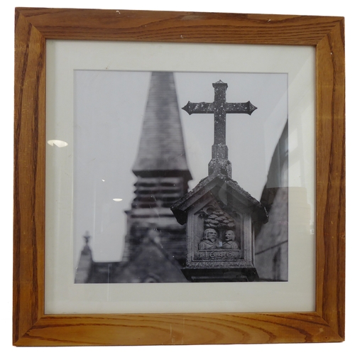 399 - A set of four wooden framed and glazed black & white photographs relating to Bourton-on-the-Water in... 