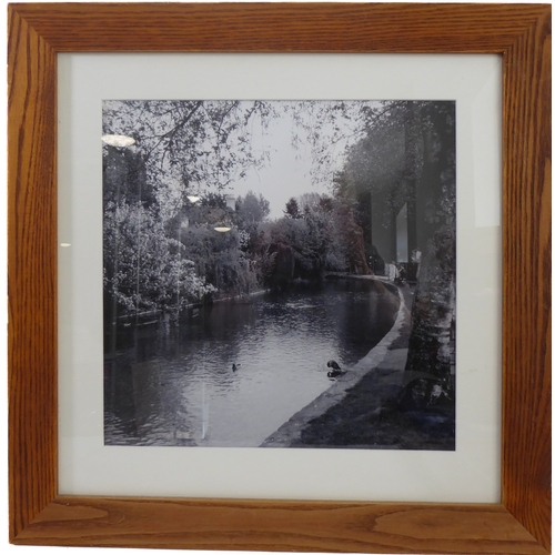 399 - A set of four wooden framed and glazed black & white photographs relating to Bourton-on-the-Water in... 