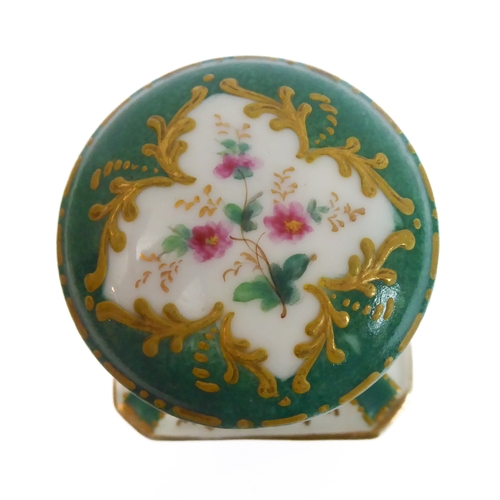 15 - A 19th century French porcelain scent bottle and mushroom-shaped stopper: both hand-gilded and decor... 