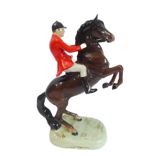 36 - Eleven pieces by Beswick:
 huntsman on a rearing horse (868);
 three foxhounds (one boxed), 
 palomi... 