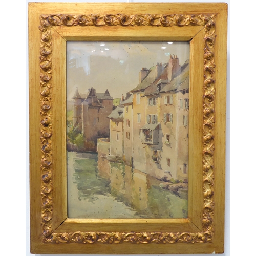 491 - A late 19th / early 20th century continental watercolour study of houses and buildings before water ... 