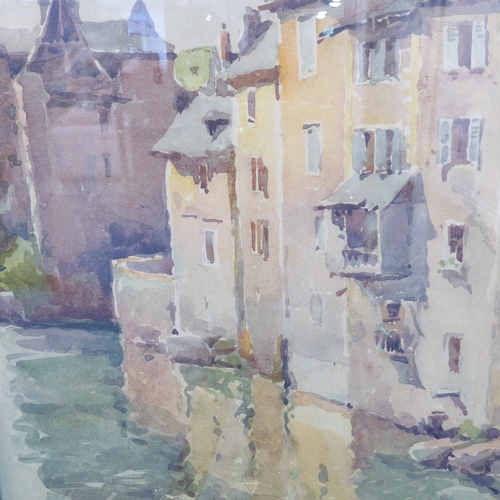 491 - A late 19th / early 20th century continental watercolour study of houses and buildings before water ... 