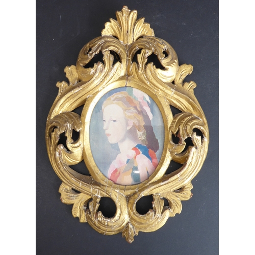 505 - A 19th century carved giltwood Florentine style picture frame: pierced in high relief with various s... 
