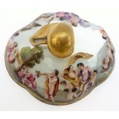 50A - A late 19th century quatrefoil-shaped, continental porcelain box and cover in Capo di Monte style: h... 