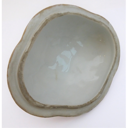 50A - A late 19th century quatrefoil-shaped, continental porcelain box and cover in Capo di Monte style: h... 