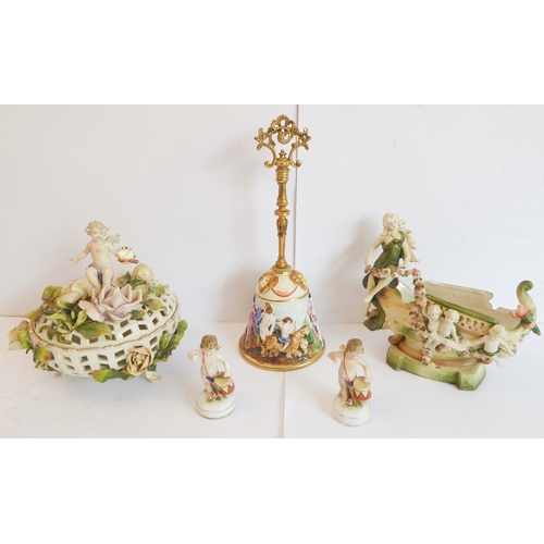 14 - A group of five comprising:
 a Capo di Monte style circular potpourri surmounted with a cherub with ... 