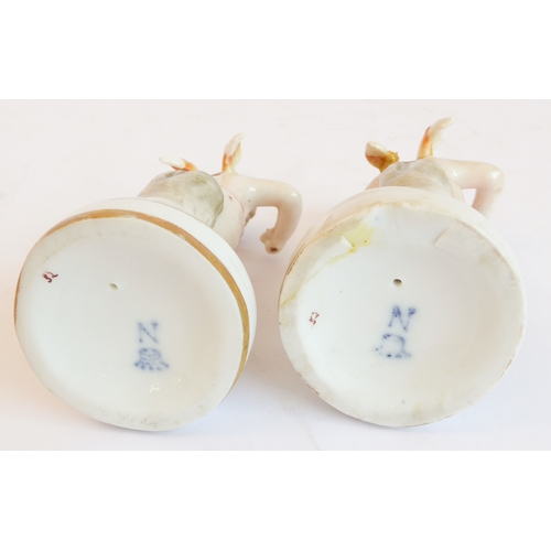 14 - A group of five comprising:
 a Capo di Monte style circular potpourri surmounted with a cherub with ... 