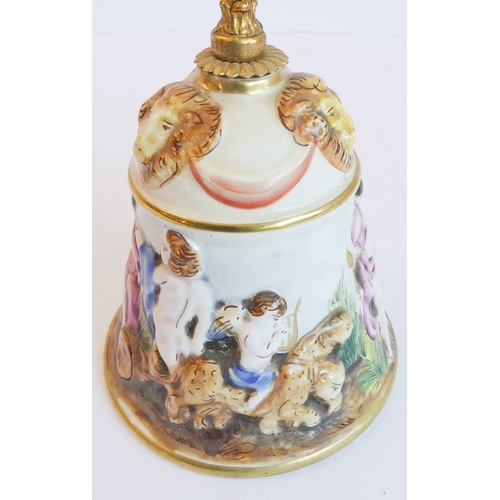 14 - A group of five comprising:
 a Capo di Monte style circular potpourri surmounted with a cherub with ... 