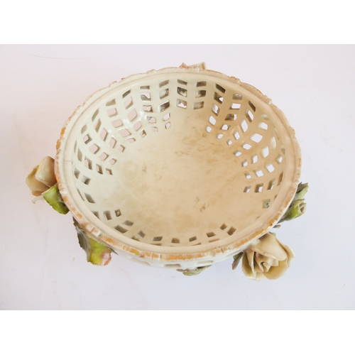 14 - A group of five comprising:
 a Capo di Monte style circular potpourri surmounted with a cherub with ... 