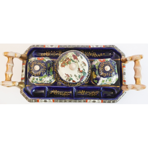 29 - A 19th century Mason's Patent Ironstone china two-handled inkstand: of boat-form and of impressive  ... 