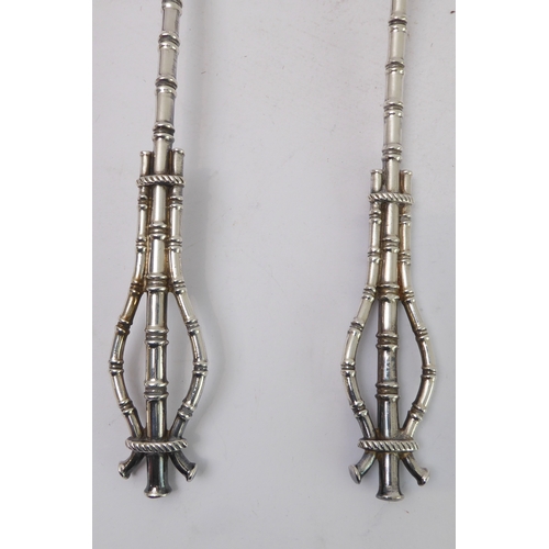 217 - A pair of late 19th century silver-plated salad servers with faux bamboo-style handles and stems, wi... 