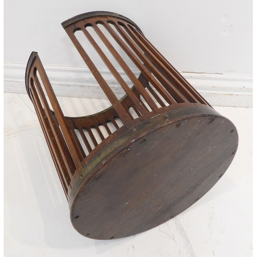 395 - A George III period circular pierced mahogany plate bucket with original swing-handle (32.5cm diamet... 