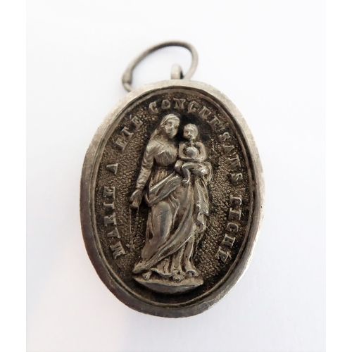 356 - A fascinating collection of seven mostly white metal and glazed religious pendant reliquaries relati... 