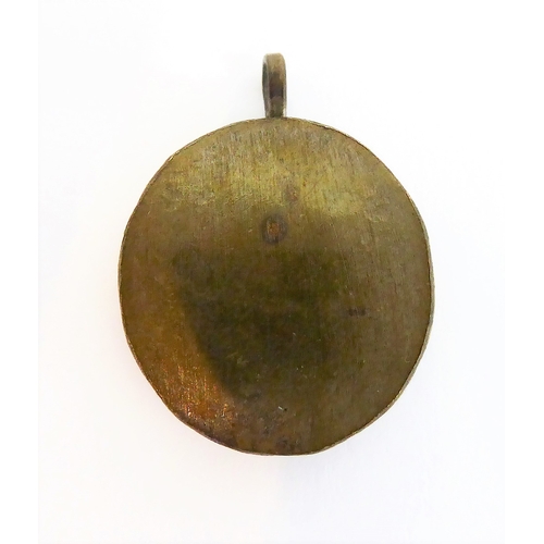 356 - A fascinating collection of seven mostly white metal and glazed religious pendant reliquaries relati... 
