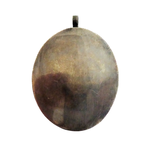 356 - A fascinating collection of seven mostly white metal and glazed religious pendant reliquaries relati... 