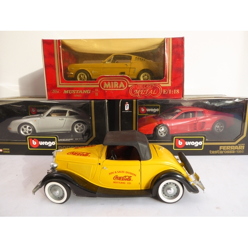 Four diecast model cars: a Burago Ferrari Testarossa (1984); a
