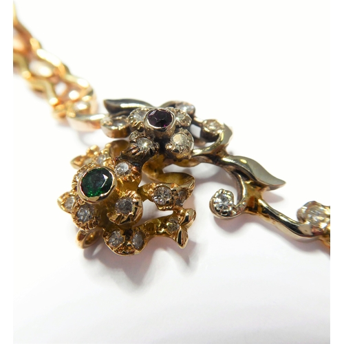165 - a 14-carat yellow gold (marked '585', Italy) openwork neck chain with an integral flowerhead style p... 