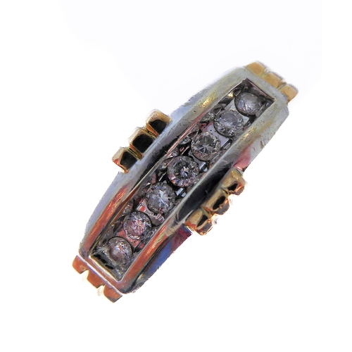 173 - A 9-carat gold ring set with seven diamonds, ring size T
