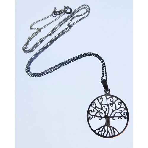 132 - A silver pendant modelled as a tree of life, upon a silver chain (boxed)