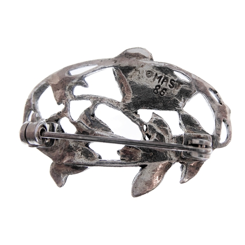 151 - An unusual silver brooch: modelled as leaves and harebells